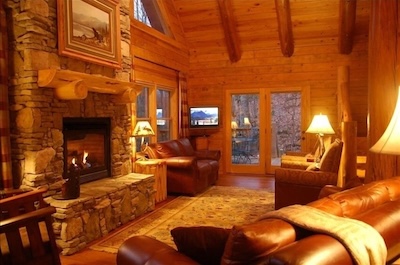 Great room with cathedral ceiling and stone fireplace